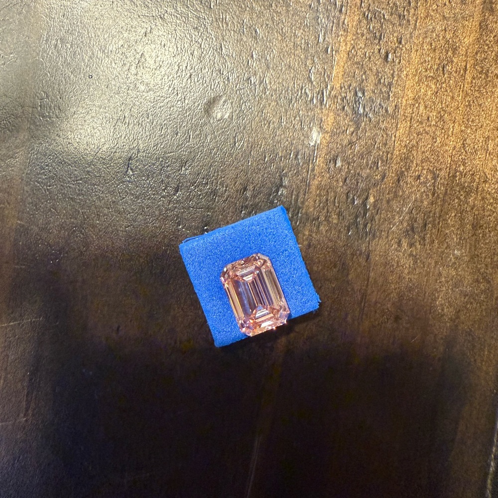 Lab grown pink loose diamond. Emerald cut 3.07 IGI certified. Fancy vivid pink.